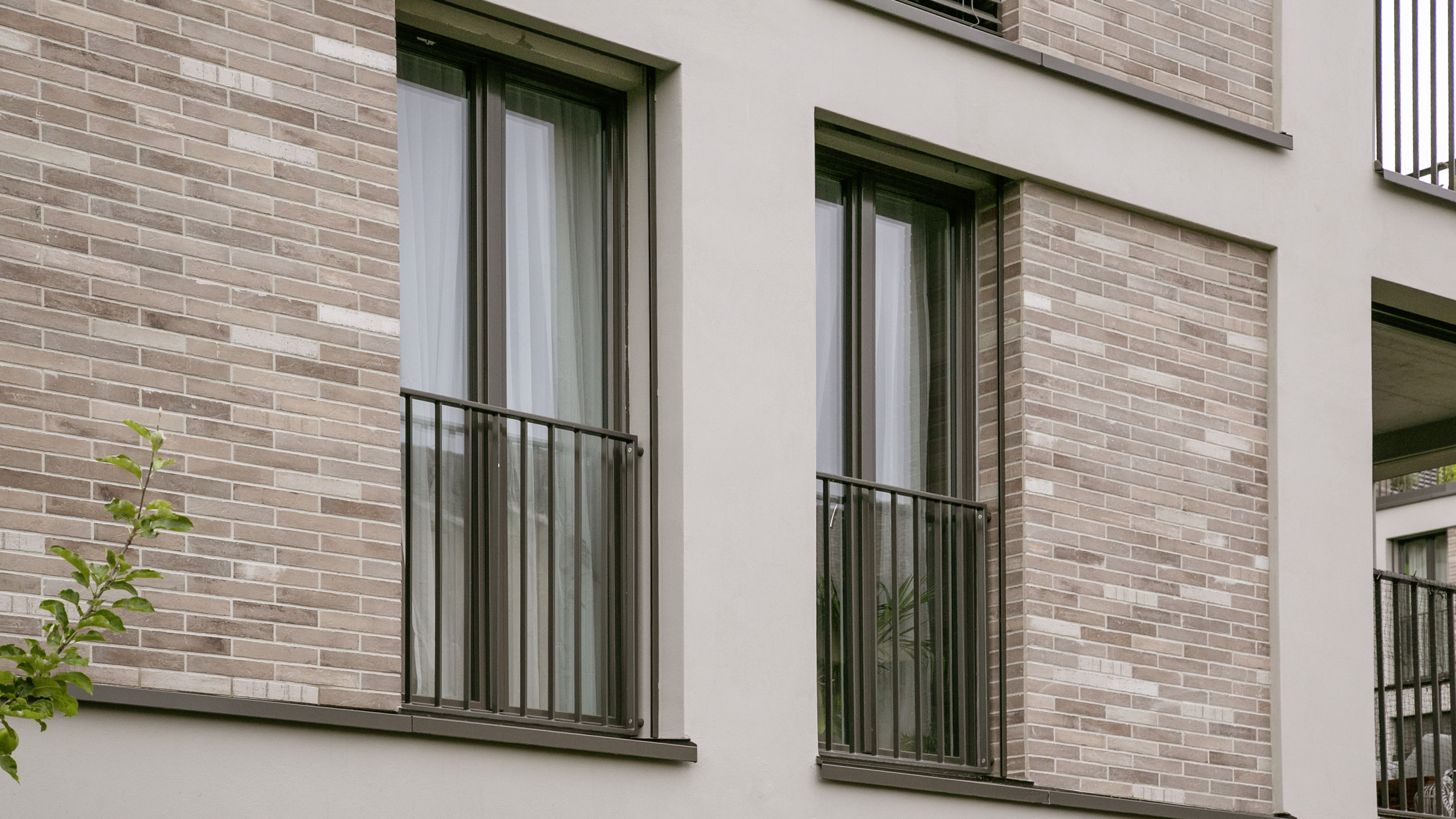 Detailansicht der Fenster der Wohnüberbauung Xaver in Binningen